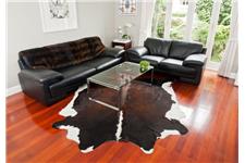 Gorgeous Creatures Cowhide Rugs & Ottomans image 3