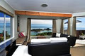 Haulashore Views - Holiday Home Accommodation, Nelson Port Hills logo
