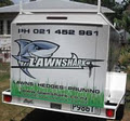 Lawn Shark Lawn Mowing Services logo
