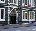 Harvey World Travel Dunedin logo